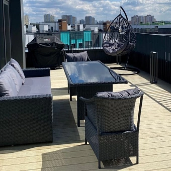 Диван, стол и кресла из состава коллекции уличной мебели из искусственного ротанга 